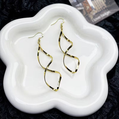 Spiral Dangle Ohrringe | Gold