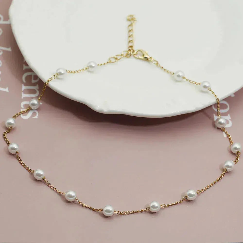 Gold Spaced Perle Chain Halskette